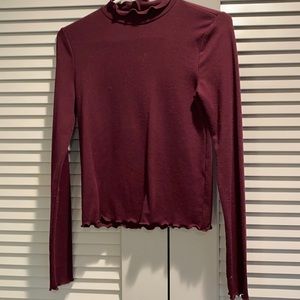 Burgundy sweater with ruffles
